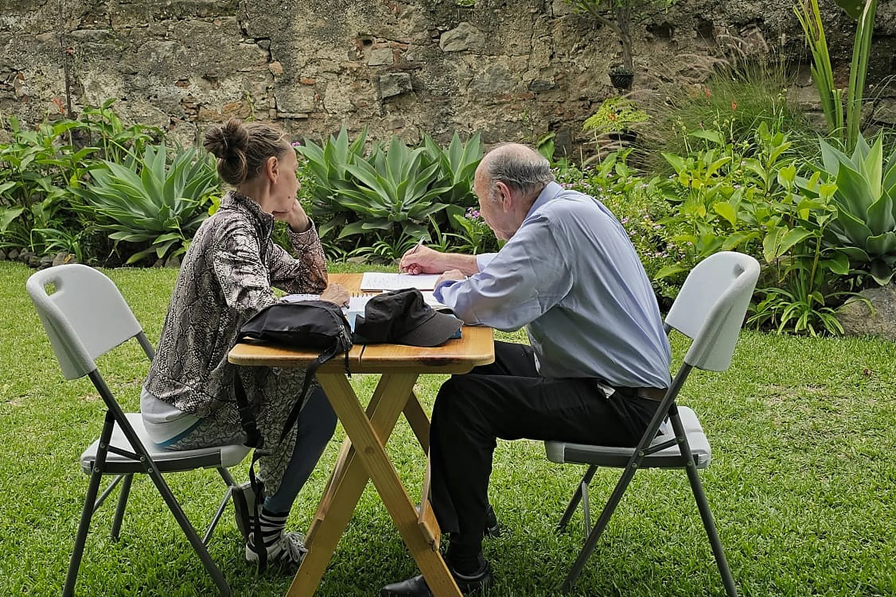 A student practicing conversational Spanish with a private teacher at Spanish Antigua in Antigua Guatemala.